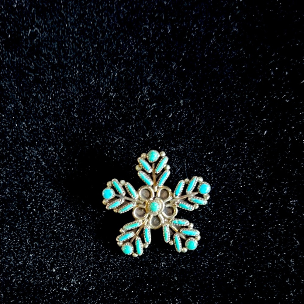 Native American sterling silver/turquoise snowflake brooch.